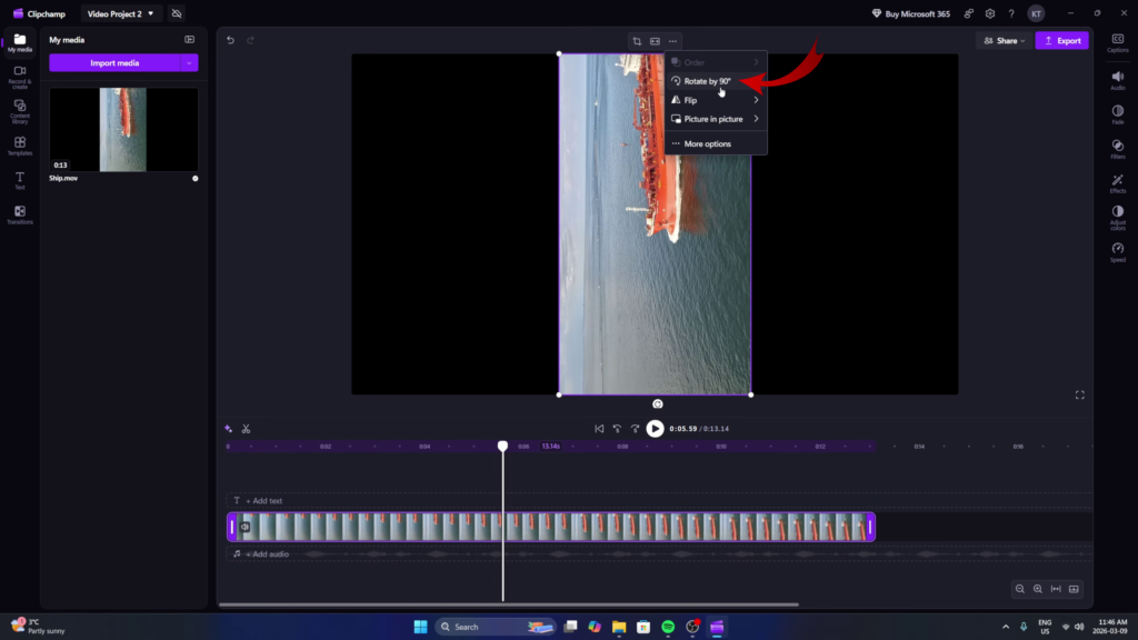 A screenshot of Microsoft Clipchamp in Windows 11 showing the process of rotating a video 90 degrees using the built-in editing tools.