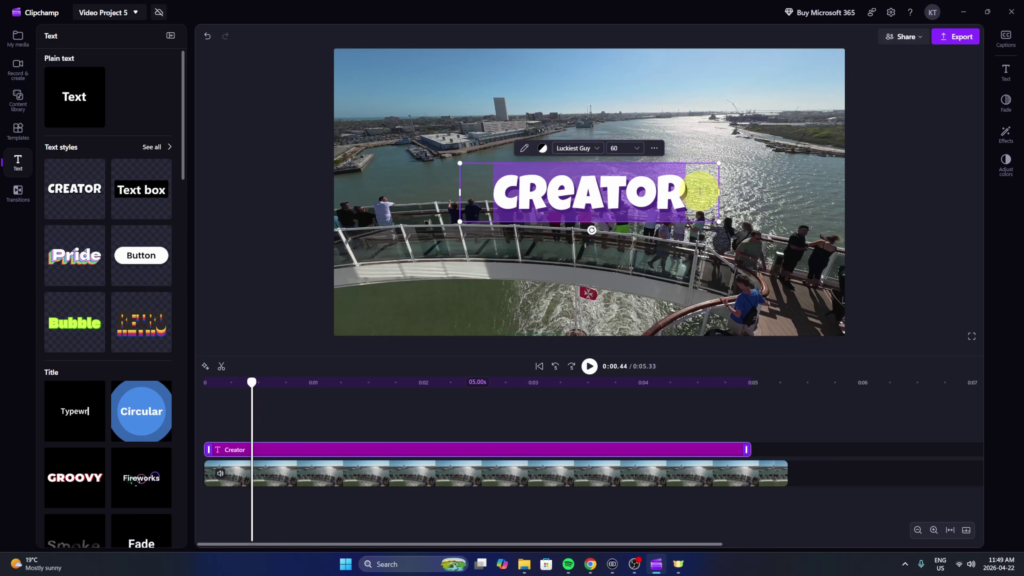 Screenshot of Microsoft Clipchamp video editor showing the text customization menu with a video clip on the timeline and "CREATOR" animated text being edited in the preview window.