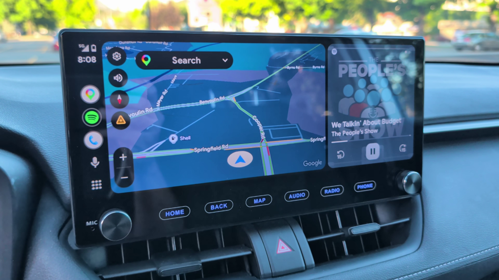 Wireless Android Auto running on the Roadanvi X14 12.3-inch touchscreen in a Toyota RAV4 with navigation and media controls displayed.