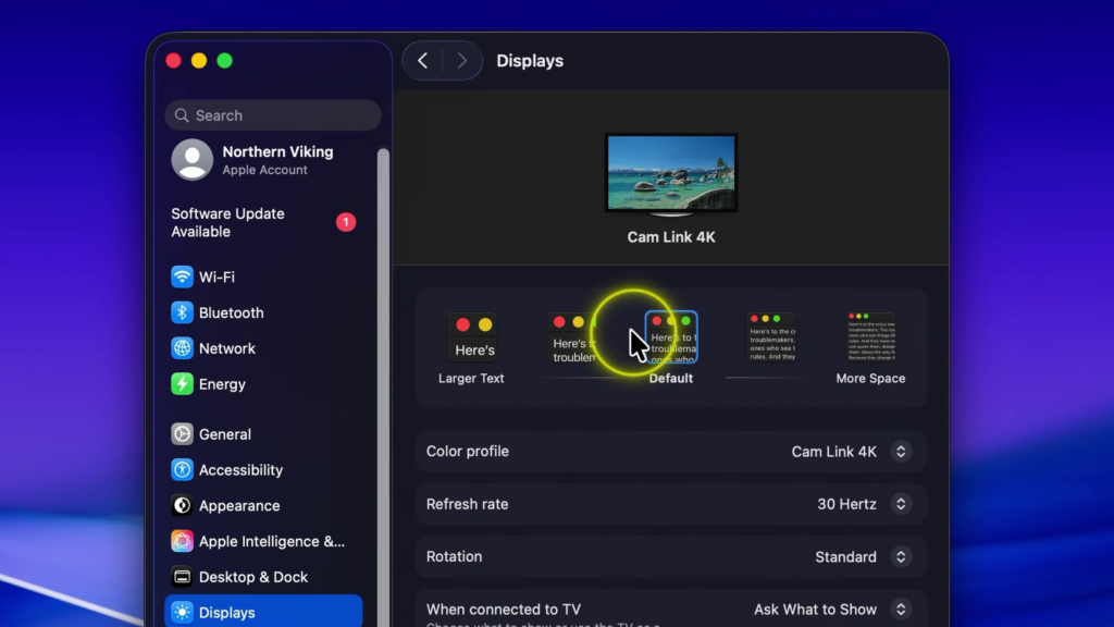 Mac display settings showing Larger Text, Default, and More Space options for adjusting text size.